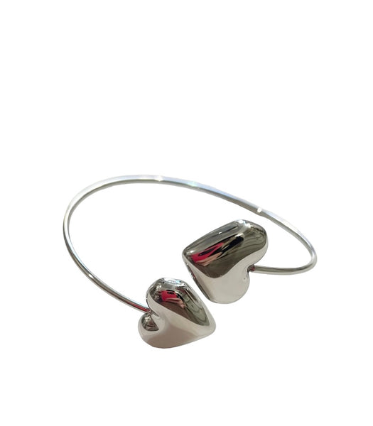 Bracciale rigido regolabile doppio cuore puff due varianti colore