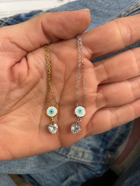 Collana girocollo occhio greco e punto luce cuore due varianti tu colore