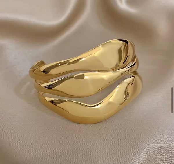 Bracciale manetta ondulato due  varianti colore