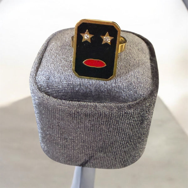Anello volto stilizzato