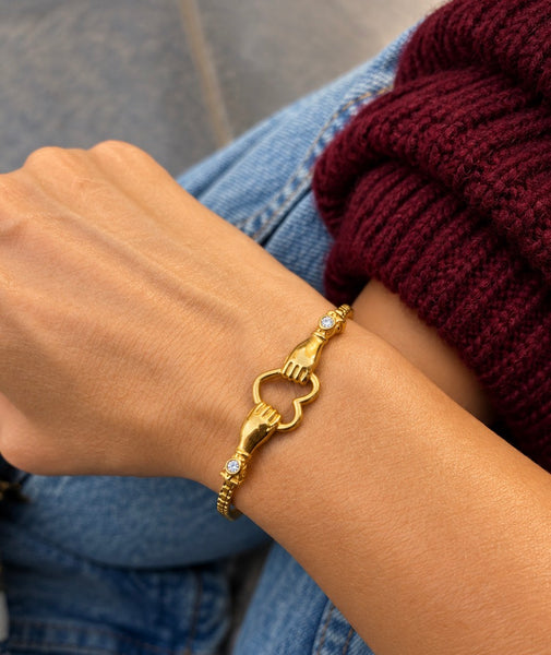 Bracciale Cuore con mani crystal  spesso due varianti colore