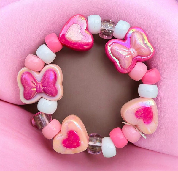 Bracciale Colors fiocchi cuori e pony Beads rosa e fuxia