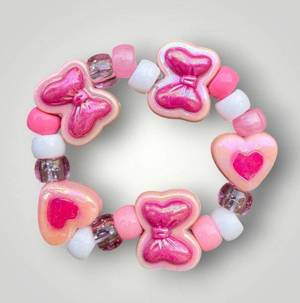 Bracciale Colors fiocchi cuori e pony Beads rosa