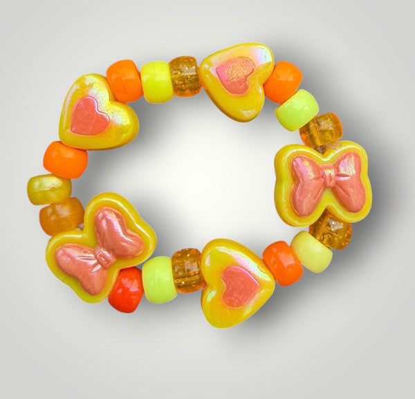 Bracciale Colors fiocchi cuori e pony Beads giallo