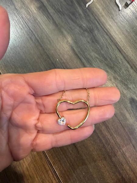 Collana cuore vuoto con punto  luce forma cuore due   varianti colore