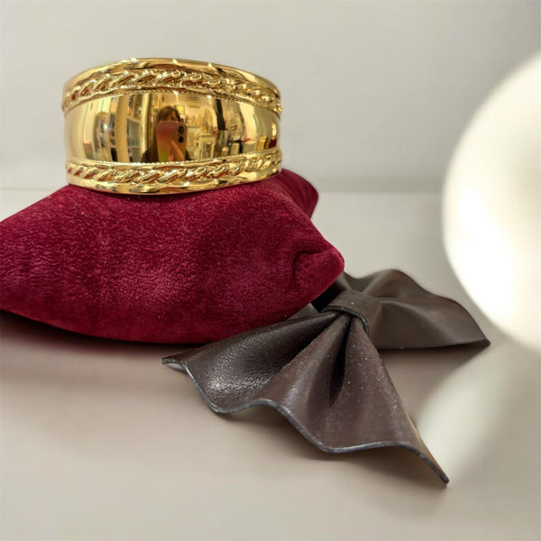 Bracciale manetta treccia due  varianti colore