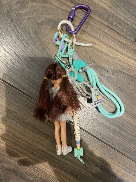 Pimp your Bag charms per borsa e
portachiavi Keychain Barbie Shelly
capelli castani abitìno verde acqua