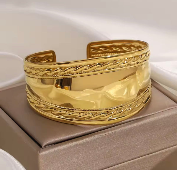 Bracciale manetta treccia due  varianti colore