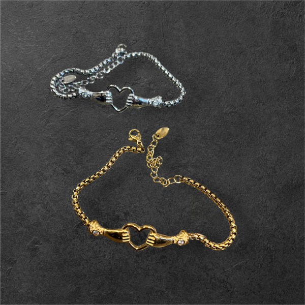 Bracciale Cuore con mani crystal  spesso due varianti colore