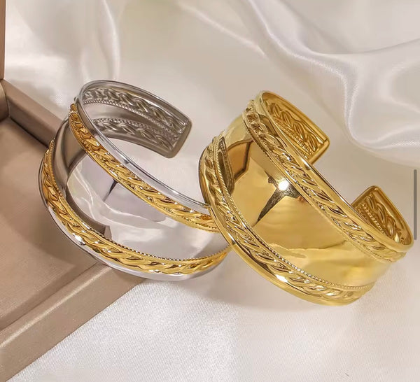Bracciale manetta treccia due  varianti colore