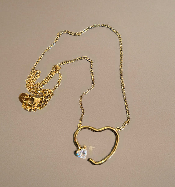 Collana cuore vuoto con punto  luce forma cuore due   varianti colore