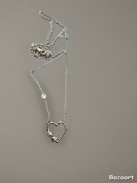 Collana cuore vuoto freccia e punto luce  due   varianti colore