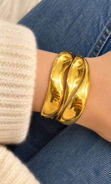Bracciale manetta ondulato due  varianti colore