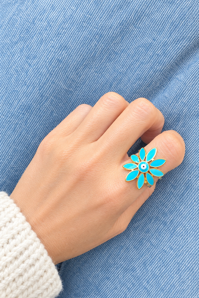 Anello delle isole Paros con fiore e occhio