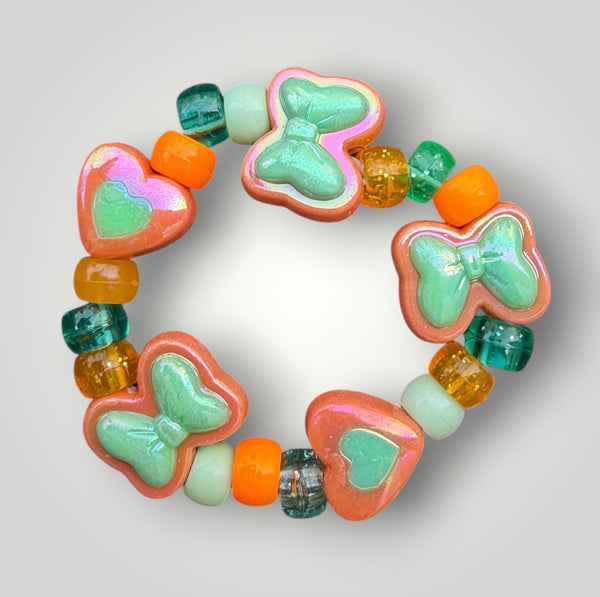 Bracciale Colors fiocchi cuori e pony Beads arancione