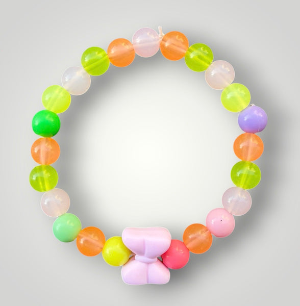 Bracciale colors con fiocco rosa