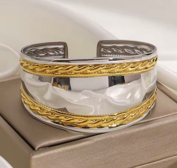 Bracciale manetta treccia due  varianti colore