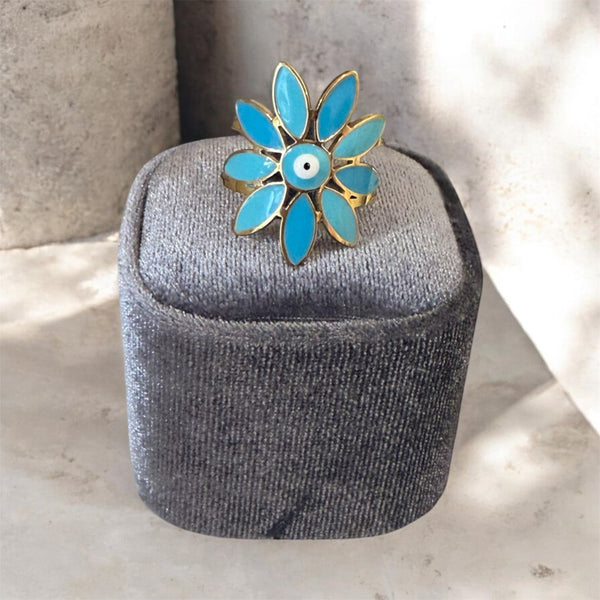 Anello delle isole Paros con fiore e occhio