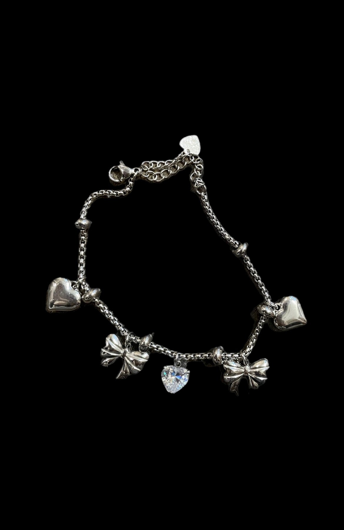Bracciale multi charms fiocchi