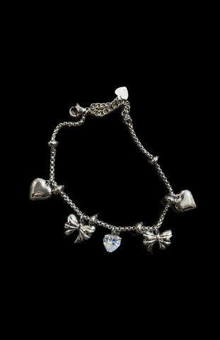 Bracciale multi charms fiocchi