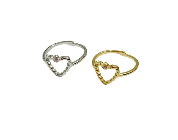 Anello cuore vuoto lavorato con punto luce