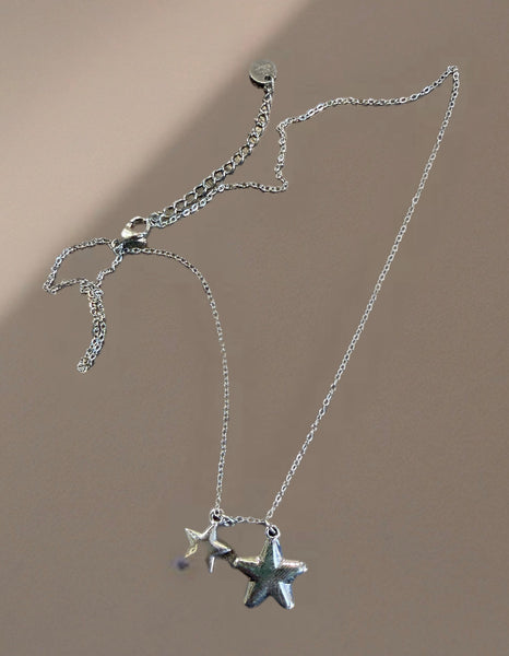 Collana doppia stella puff due   varianti colore
