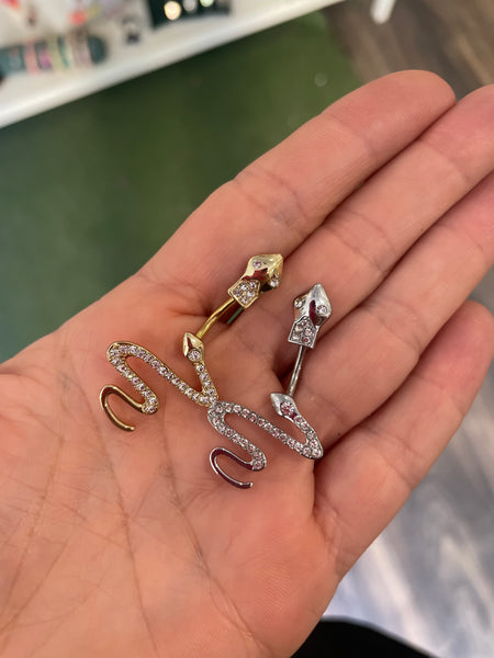 Piercing ombelico serpente