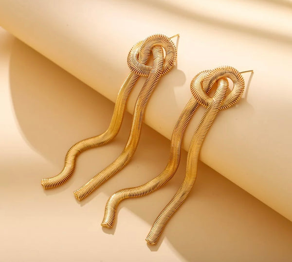 Coppia orecchini  snake piatto nodo