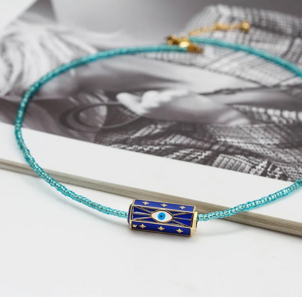 Collana amuleto turco cilindrico perline tonde vari colori