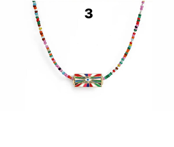 Collana amuleto turco cilindrico perline tonde vari colori