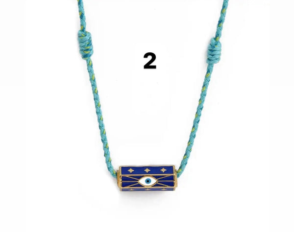 Collana amuleto turco cilindrico con cordino in vari colori