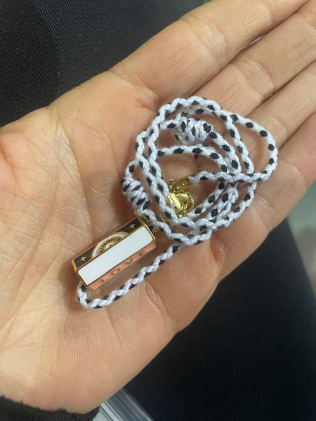 Collana amuleto turco cilindrico con cordino in vari colori