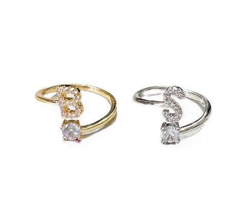 Anello lettera iniziale e punto luce regolabile