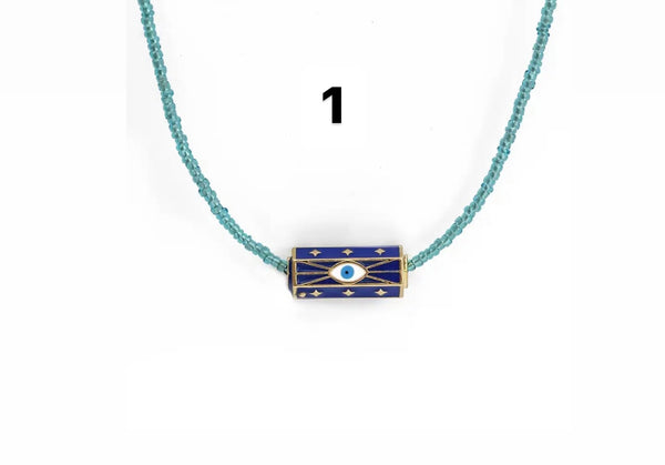 Collana amuleto turco cilindrico perline tonde vari colori