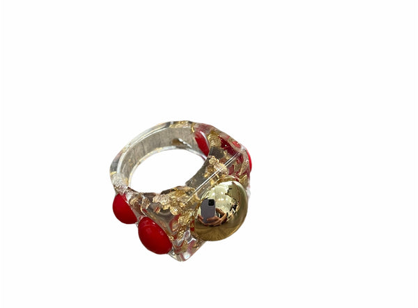 Anello resina borchie colorate l’anello sceglie dove andare