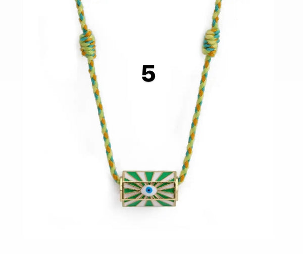 Collana amuleto turco cilindrico con cordino in vari colori