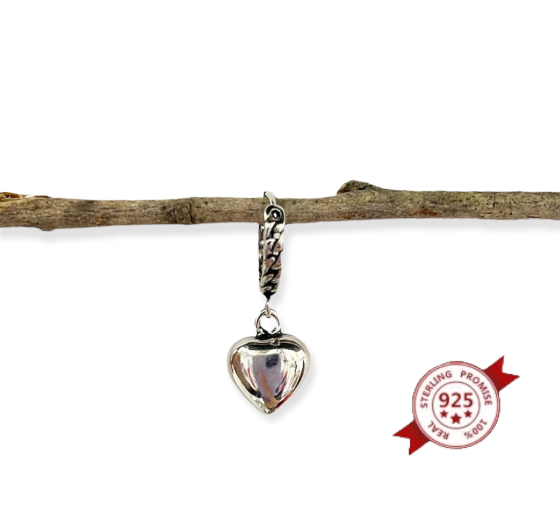 Mono orecchino cuore tridimensionale argento 925