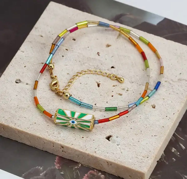 Collana amuleto turco cilindrico  vari colori collanina con perline baquette