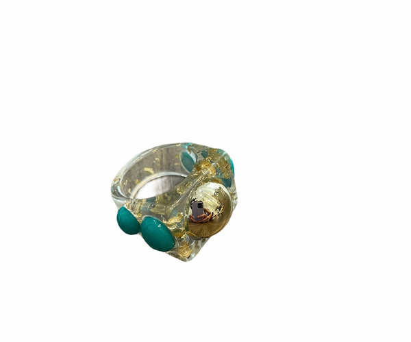 Anello resina borchie colorate l’anello sceglie dove andare