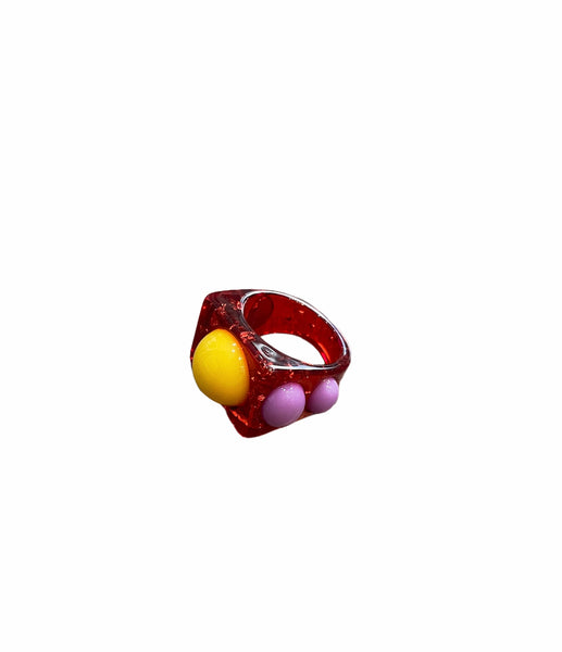 Anello resina borchie colorate l’anello sceglie dove andare
